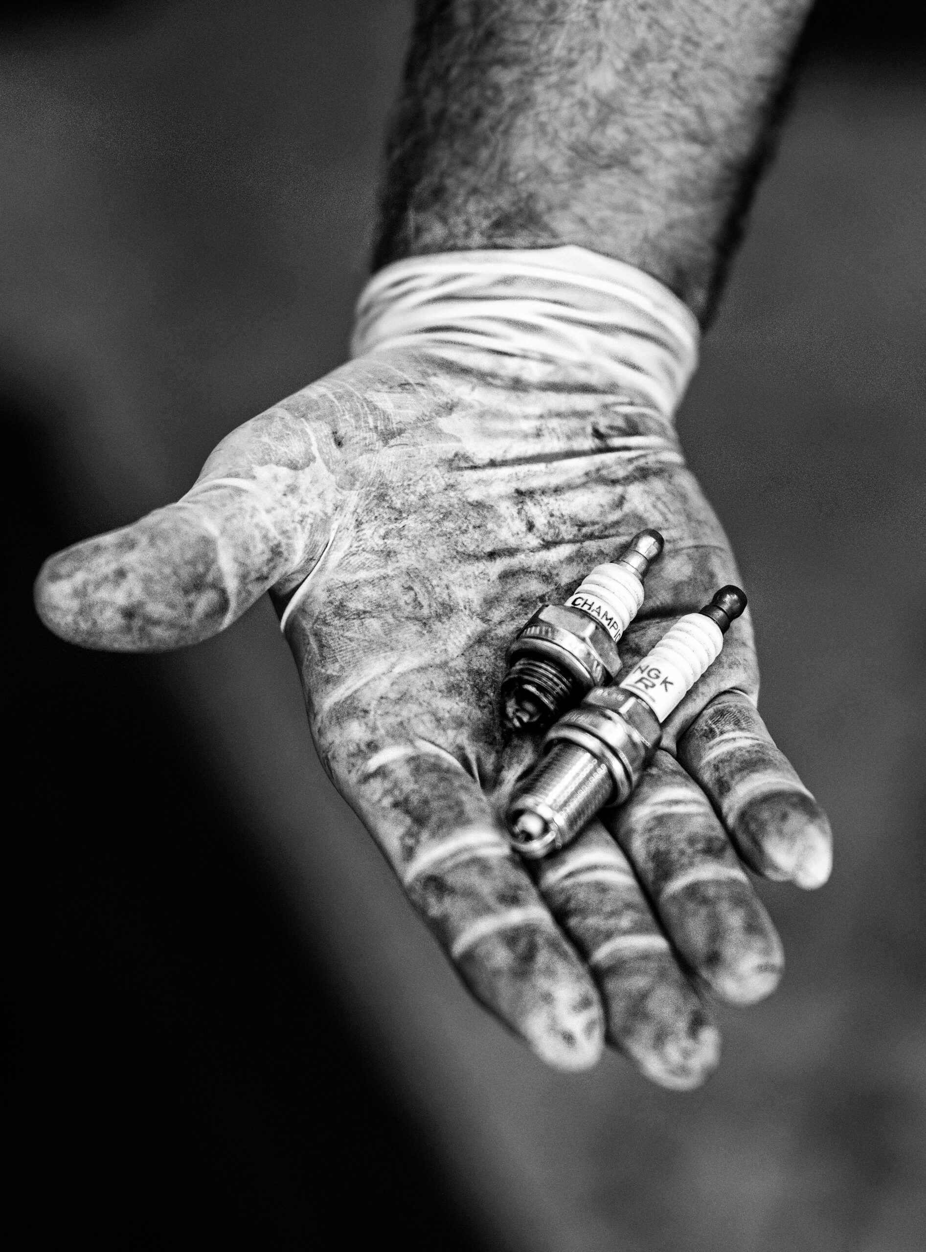 Hand with SparkPlugs spark plugs Hand with Spark Plugs